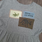 Triceratops Study Smock Dress - Size 12/14